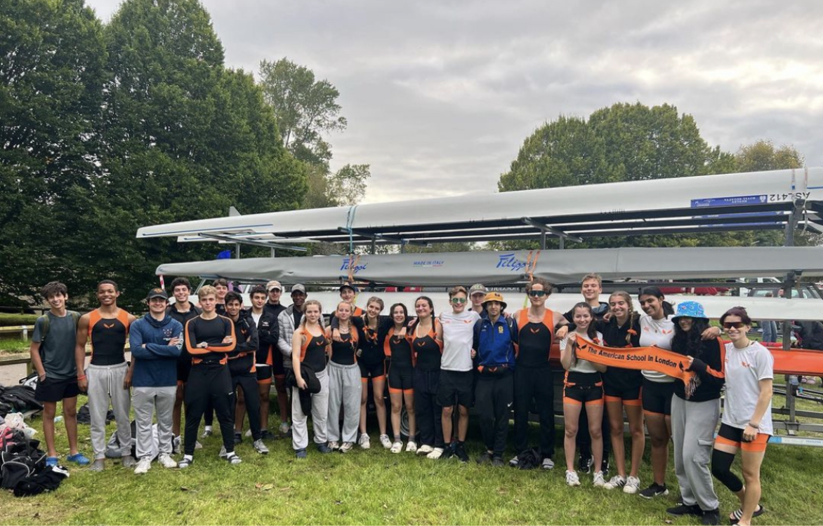 The crew team celebrates together after the majority of the team’s first race of the season at the Wallingford Long Distance Sculls Sept. 30. The team competed in the race after training throughout the fall in preparation for their upcoming races. 